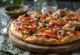 Pizza Capricciosa Pedas dengan cabai disajikan