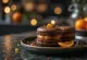 Macaron cokelat-marzipan-jeruk manisan disajikan