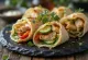 Mini wrap bites dengan isian ayam dan sayuran, disajikan segar dan menggugah selera
