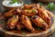 Sayap ayam bumbu rempah disajikan