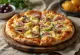 Pizza Capricciosa ekstra artichoke disajikan